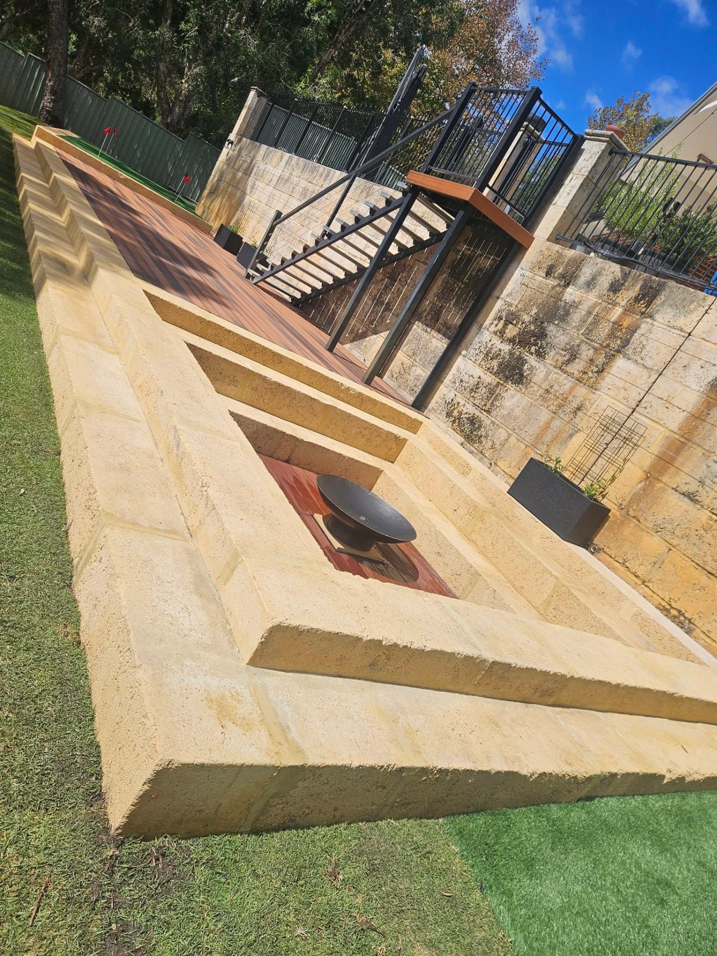 Sunken limestone firepit